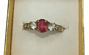 Small Pink Stone Ring on a Gold colour Band